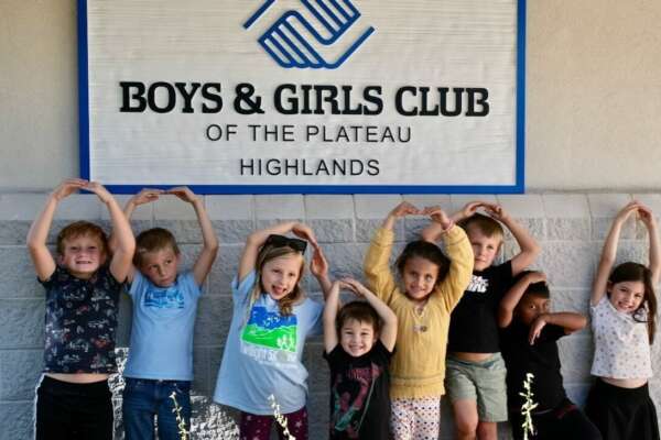 Kids in front of Boys & Girls Club of the Plateau Highlands